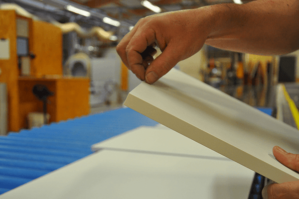 Neatly glued edge on a wooden panel 