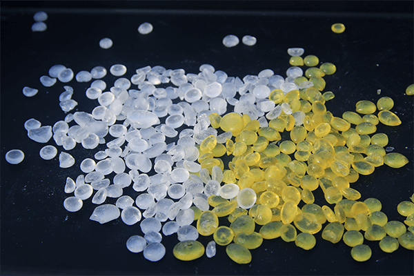 Different colors of adhesive granules