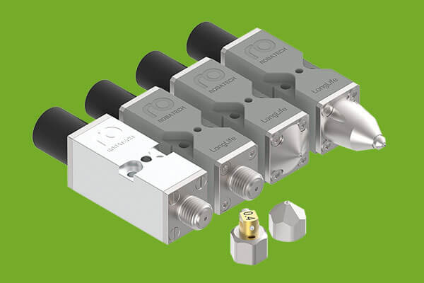 Four jetting elements with hot melt application nozzles from Robatech for bead and dot application