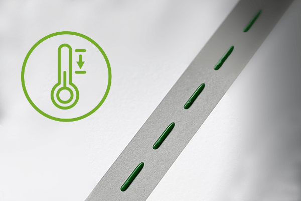 Raupenauftrag in Grün und Icon für reduzierte Auftragstemperatur (Coolmelt)