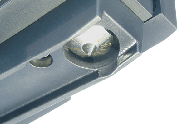 View from below of the adhesive application nozzle with aluminum nozzle protection