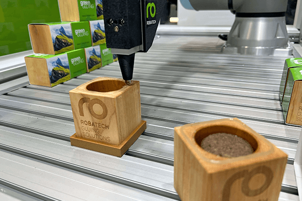 Adhesive application with cobots